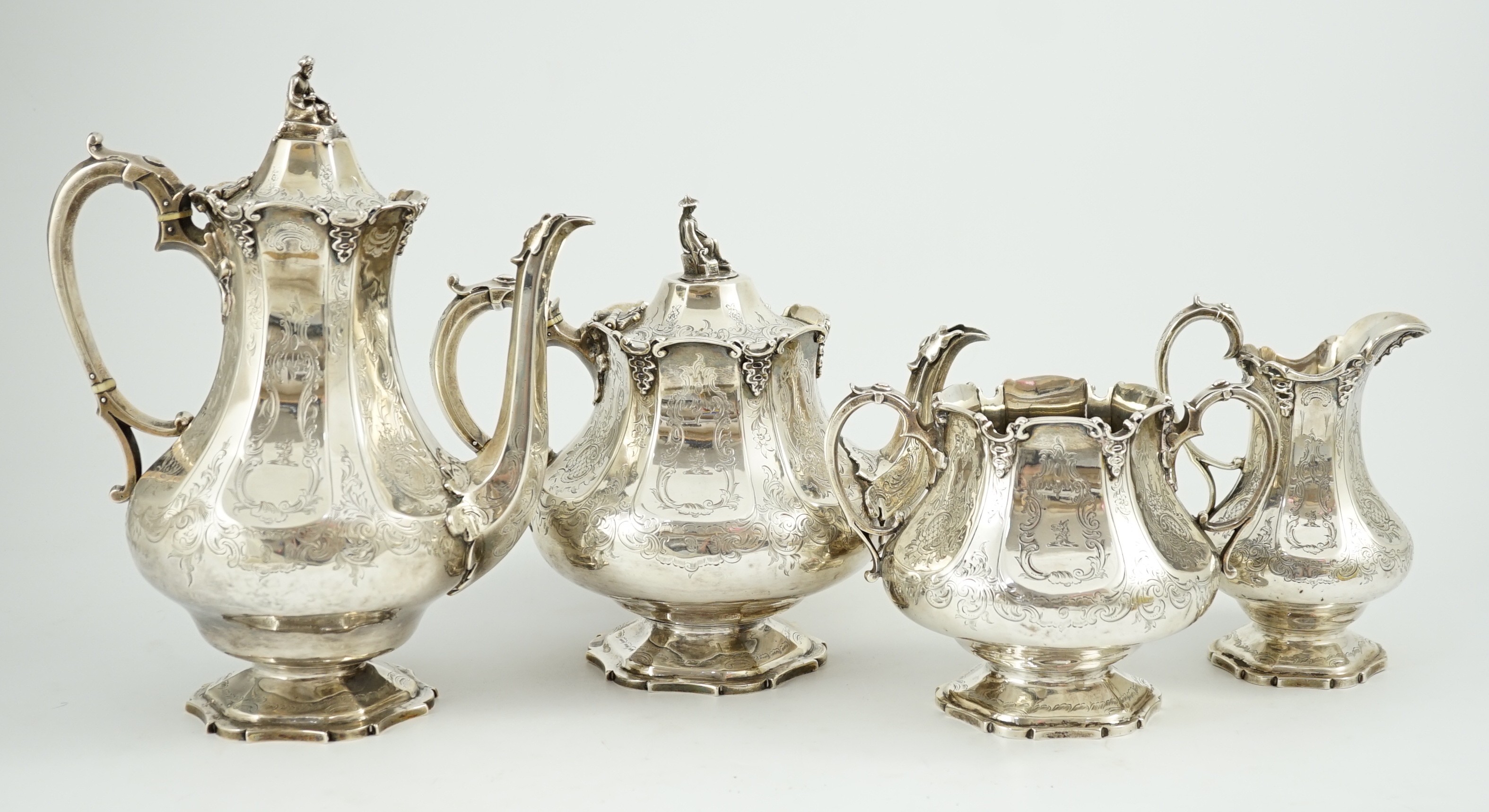 A Victorian silver pedestal four piece tea and coffee service by Robert Harper